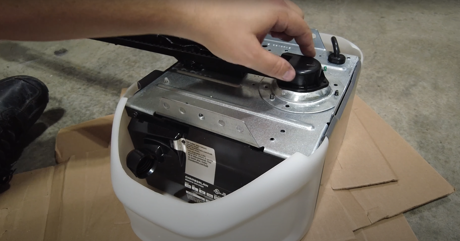 a garage door opener getting repaired