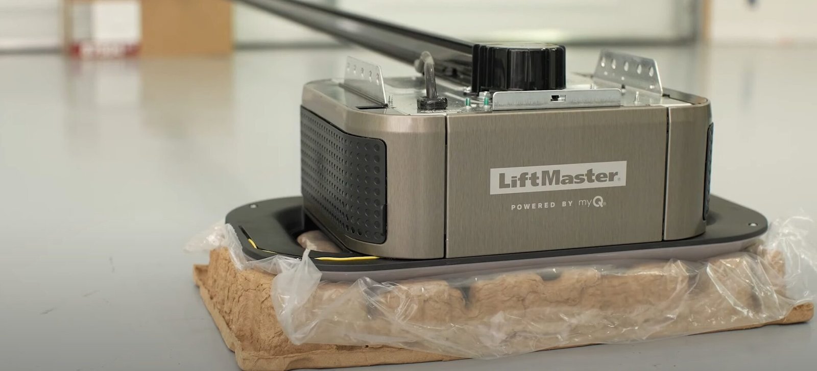 A skilled professional from Element Garage Doors Repair LLC realigning a garage door track to ensure smooth operation